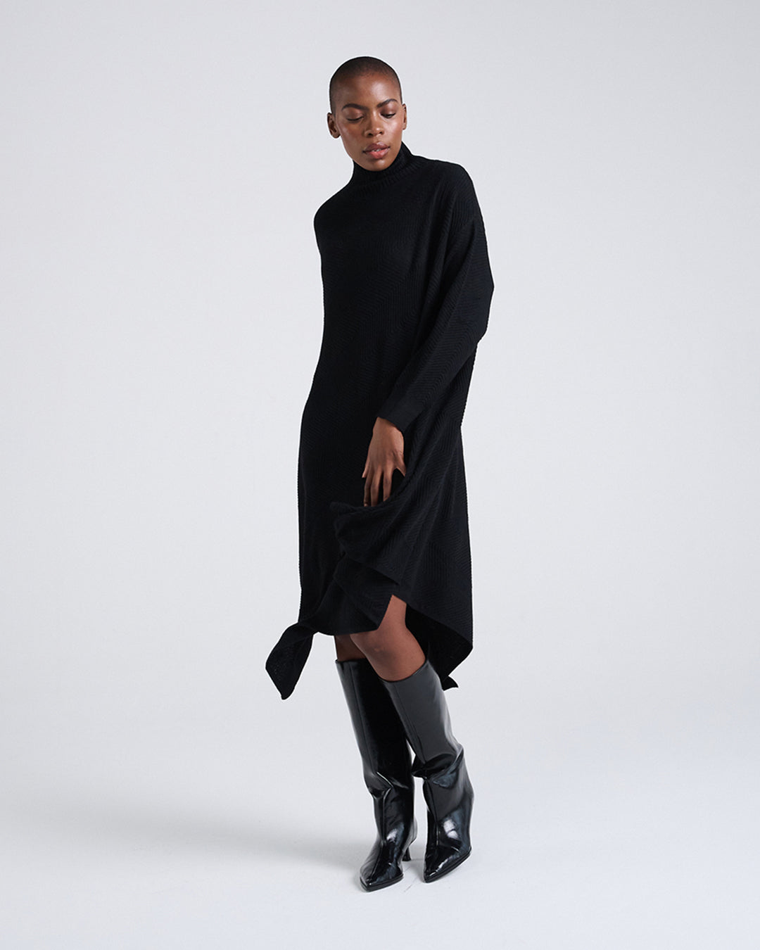 Made to Move, Draped to Flow-Wool Blend Asymmetrical Hem Diagonal Rib Mock Neck Long Sleeve Knit Dress in Black