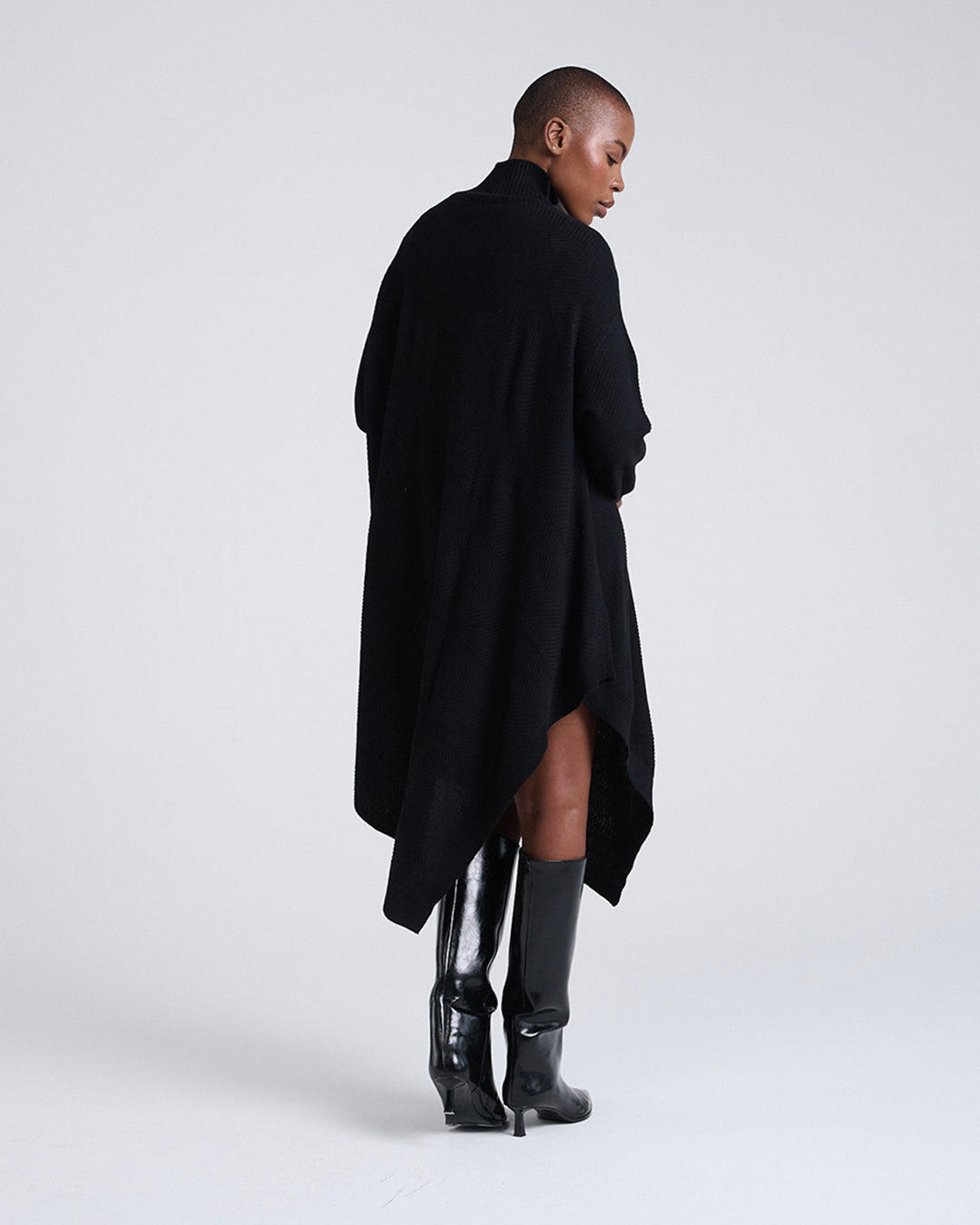 Made to Move, Draped to Flow-Wool Blend Asymmetrical Hem Diagonal Rib Mock Neck Long Sleeve Knit Dress in Black
