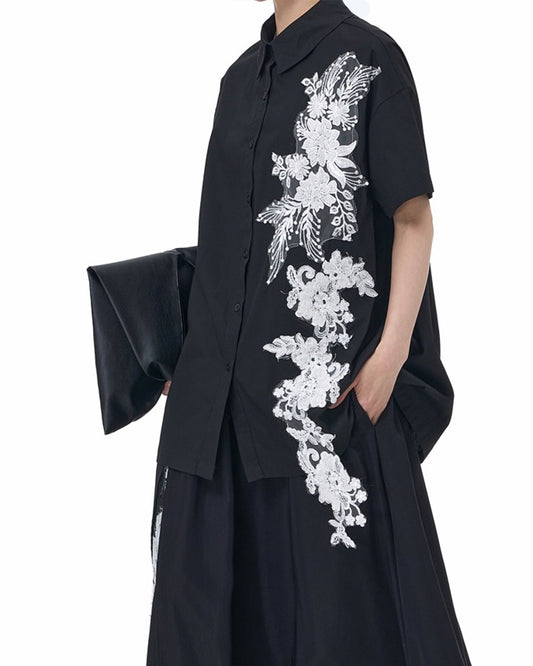 Shirt Featuring a Large Lace Decoration