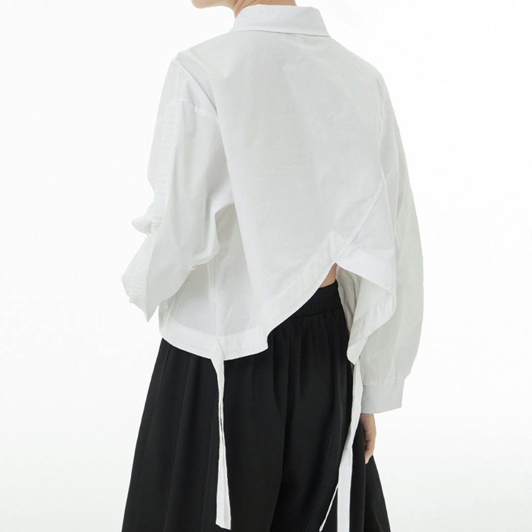 In Stock Ruffles Decorated Pockets Back Asymmetric Curvy Cutting Cotton Shirt Available in Black and White