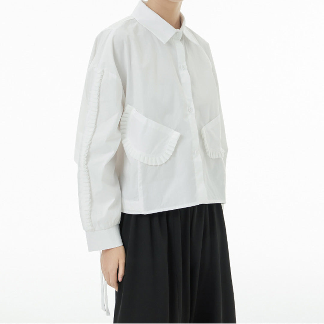In Stock Ruffles Decorated Pockets Back Asymmetric Curvy Cutting Cotton Shirt Available in Black and White