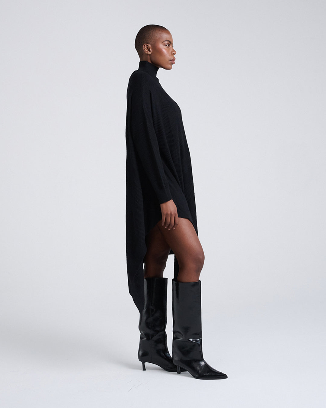 Made to Move, Draped to Flow-Wool Blend Asymmetrical Hem Diagonal Rib Mock Neck Long Sleeve Knit Dress in Black