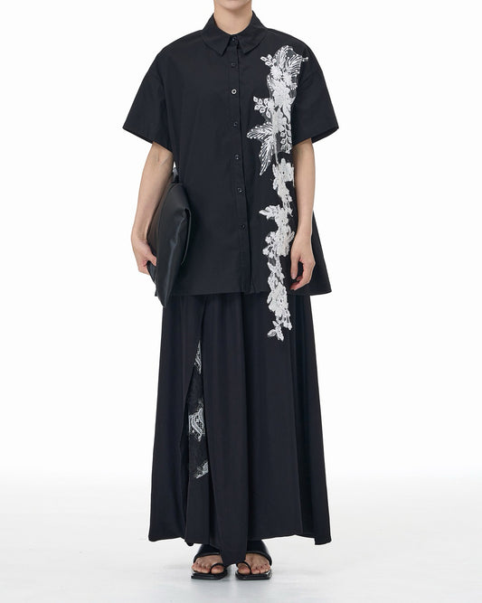 Shirt Featuring a Large Lace Decoration