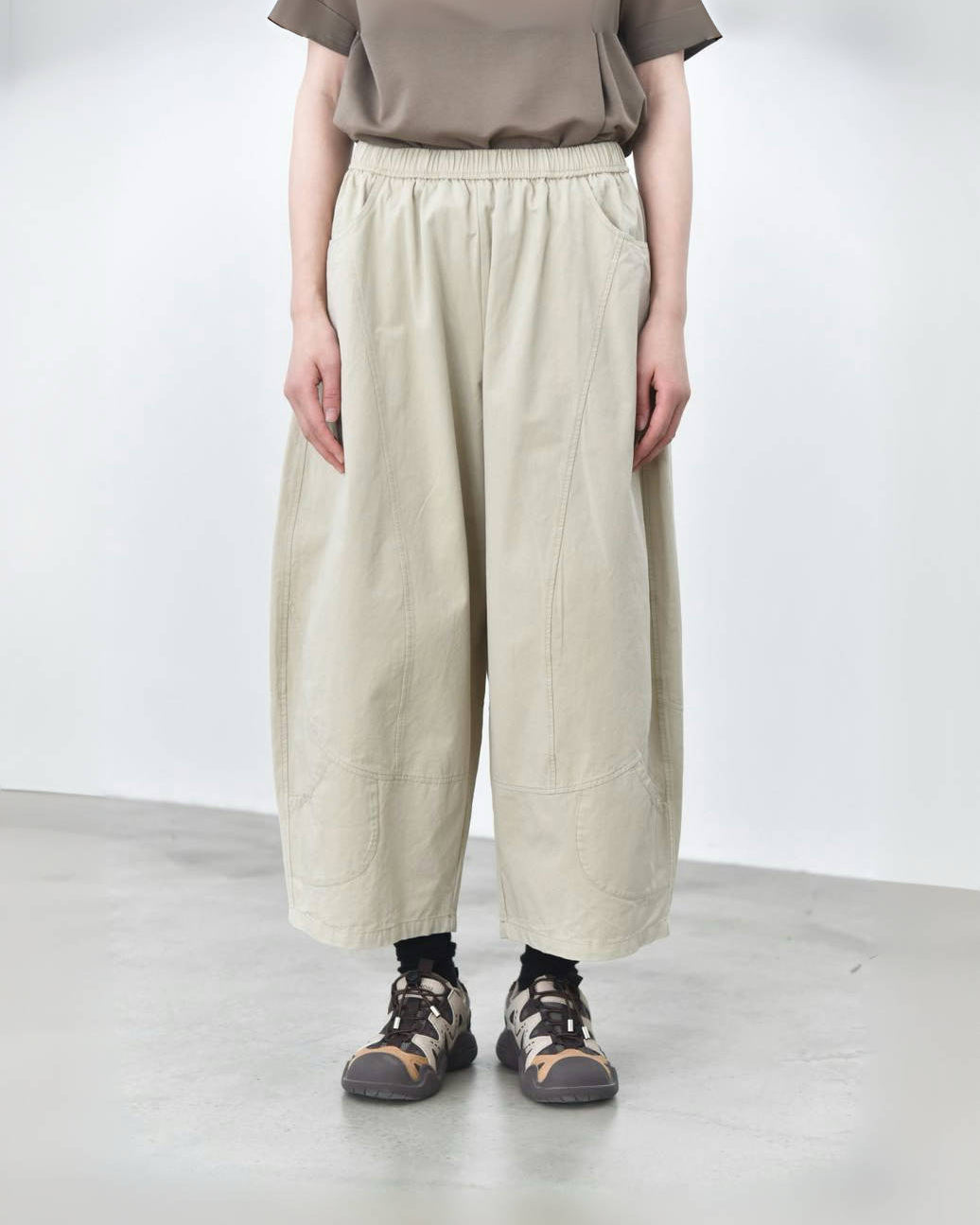 Washed Cargo Pants with Panelled Pocket Details at the Hem