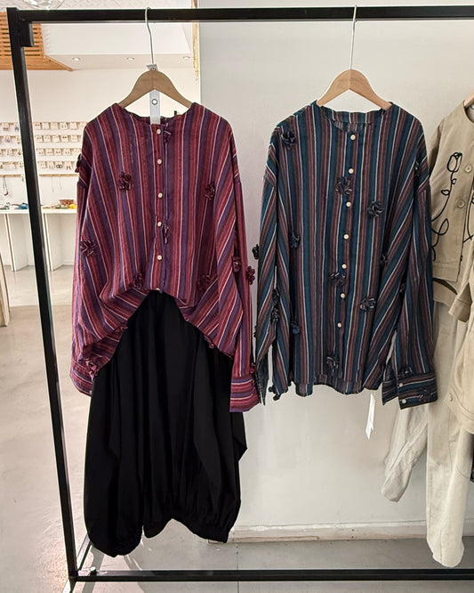 Striped shirt with 3D floral appliqués