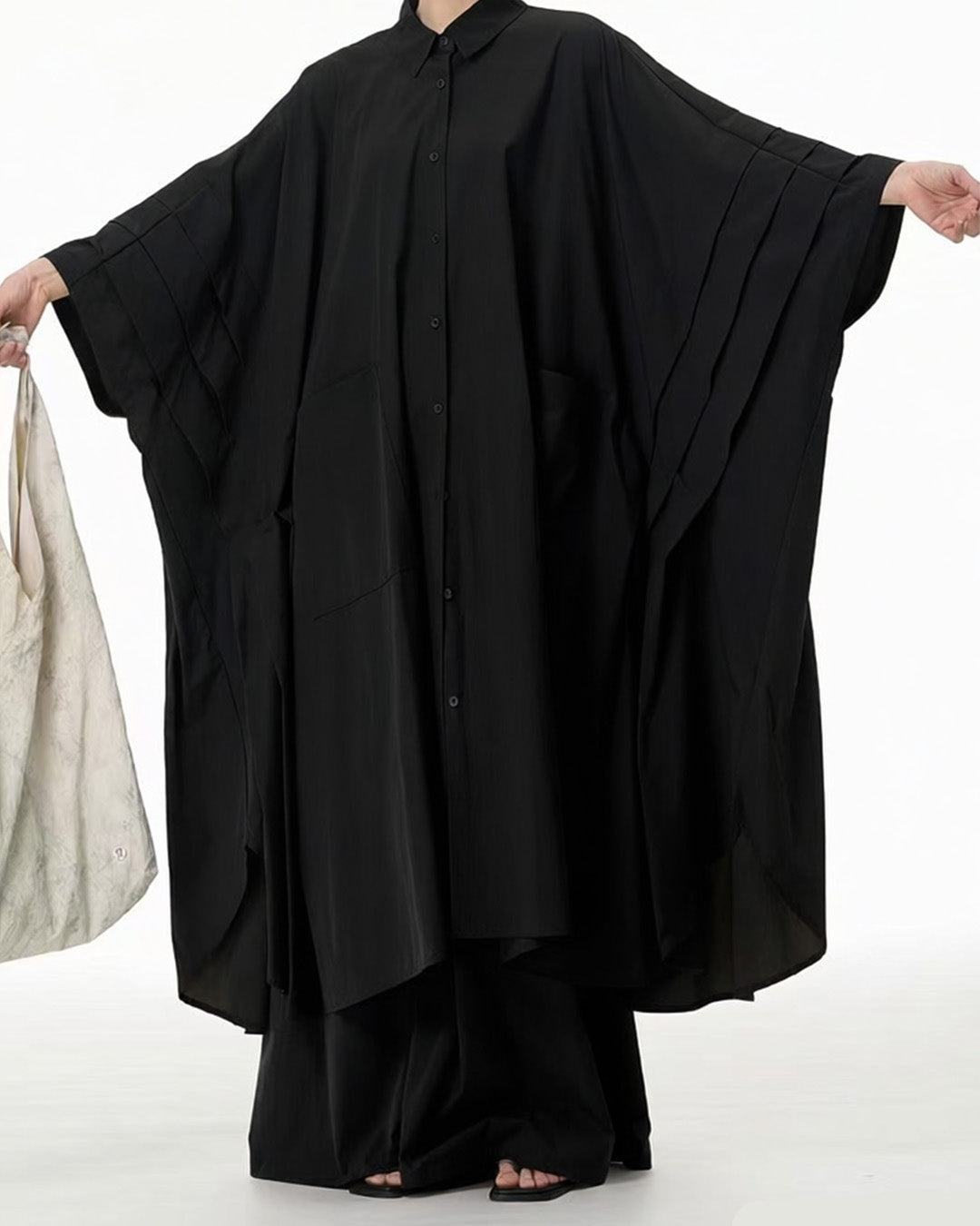 Structured Continuous Pleat Cape Dress