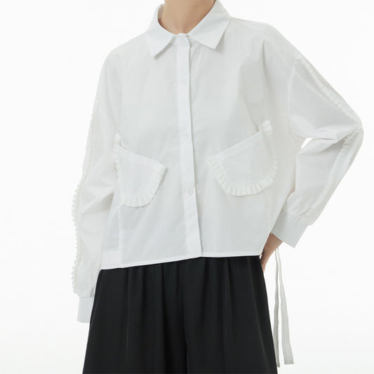 In Stock Ruffles Decorated Pockets Back Asymmetric Curvy Cutting Cotton Shirt Available in Black and White